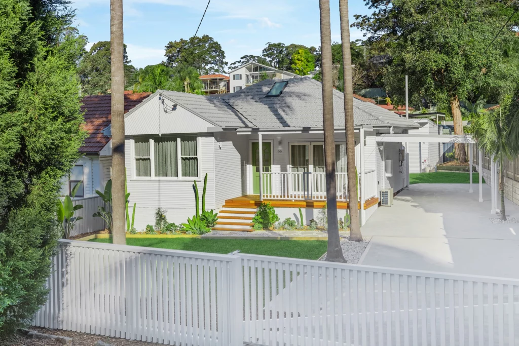 Front facade of a newly renovated home with landscaped garden in Newcastle