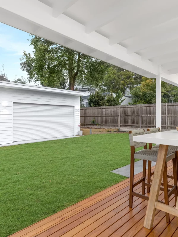 Outdoor fire pit next to shed and concrete flooring in Newcastle backyard