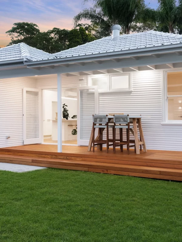 Elegant home renovation with French doors leading to deck in Newcastle