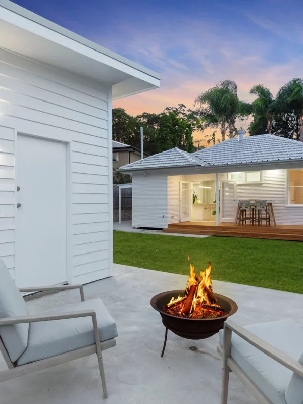 Transformed outdoor deck with fire pit area in a Newcastle renovation project